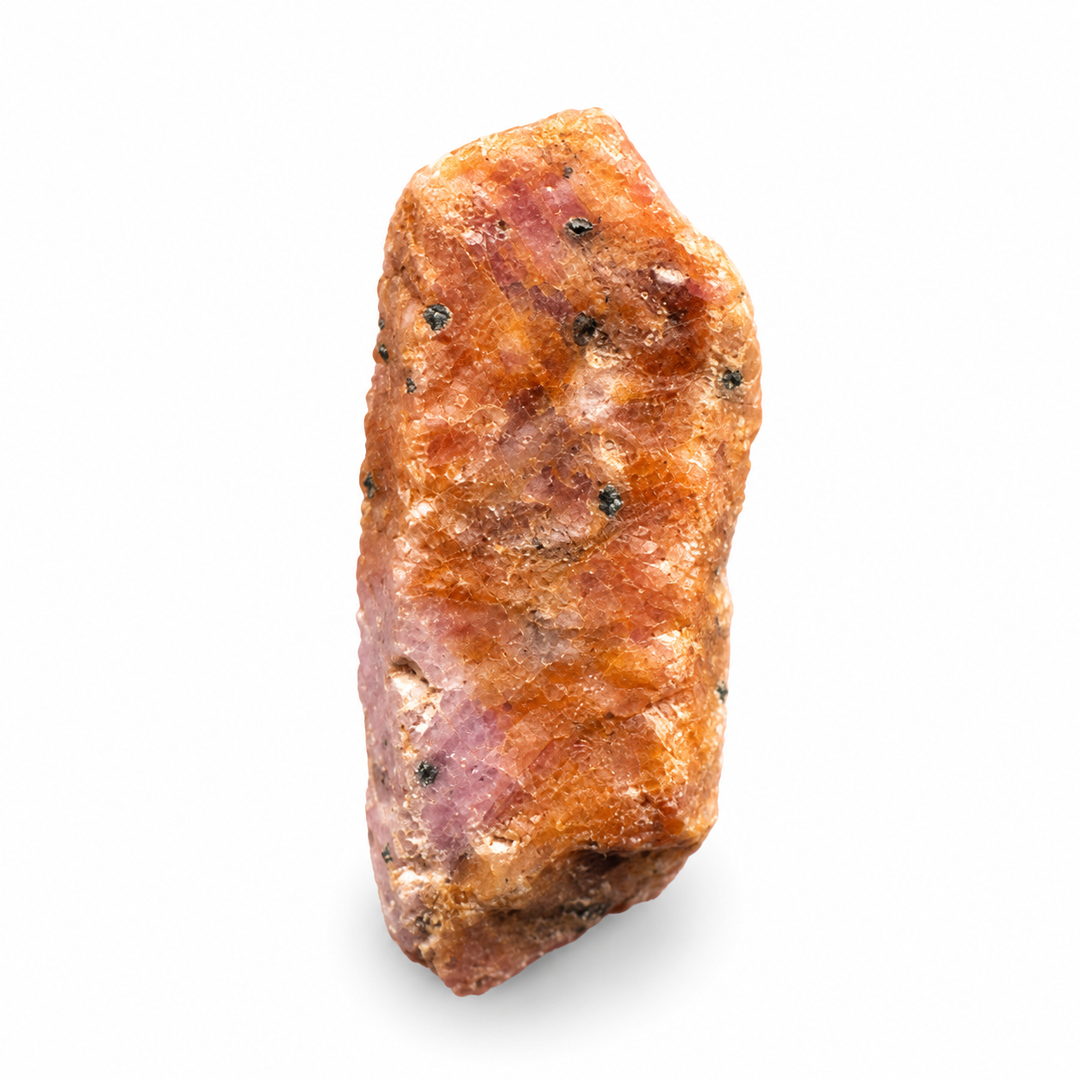 GeoFossils Ruby mineral specimen 212 showing its natural pink and reddish tones with a rough crystal surface on a white background.