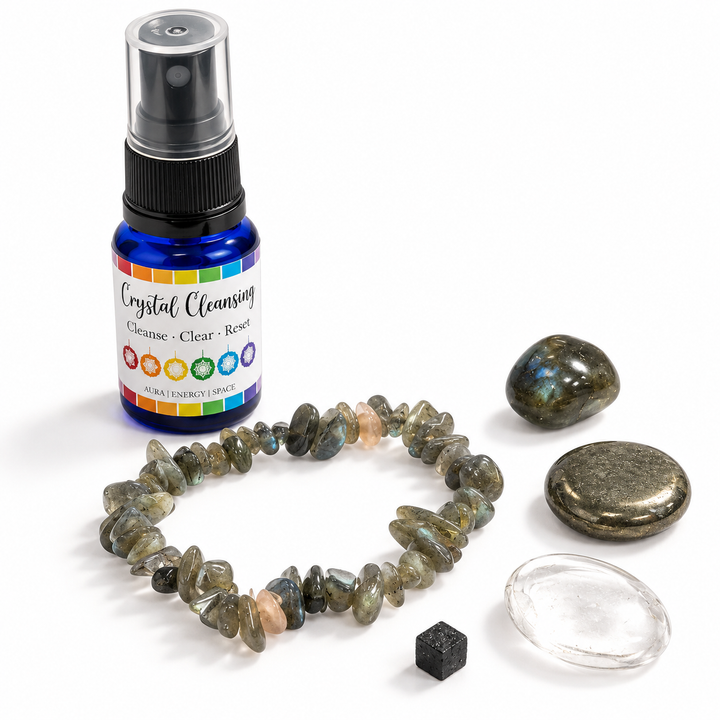 Sagittarius crystal collection with gemstone chip bracelet, crystal cleansing spray and five polished and natural stones arranged on a white background.