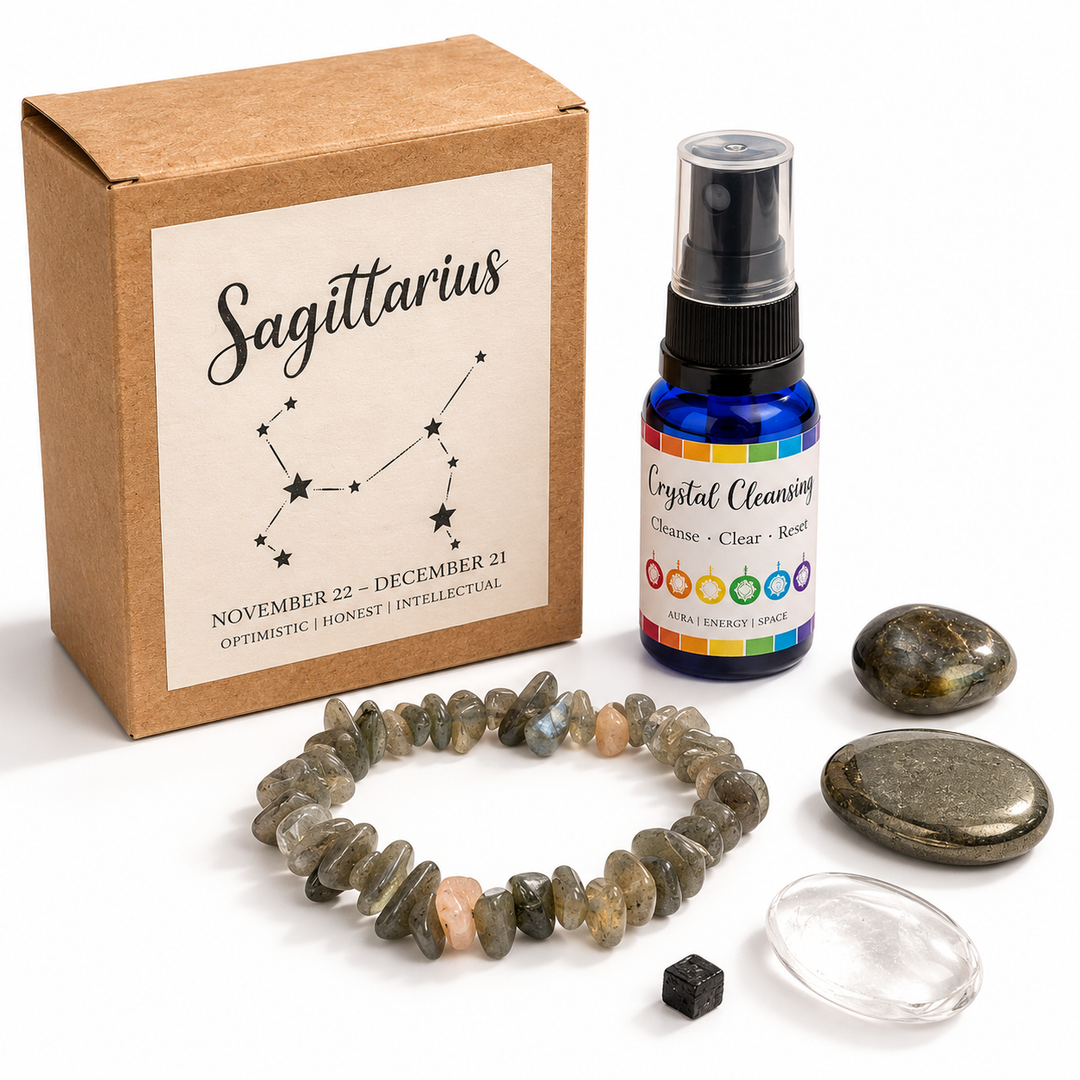 Sagittarius Zodiac Crystal Set featuring a labelled gift box, crystal cleansing spray, gemstone chip bracelet and five individual crystals on a white background.