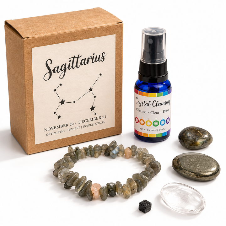 Sagittarius Zodiac Crystal Set featuring a labelled gift box, crystal cleansing spray, gemstone chip bracelet and five individual crystals on a white background.