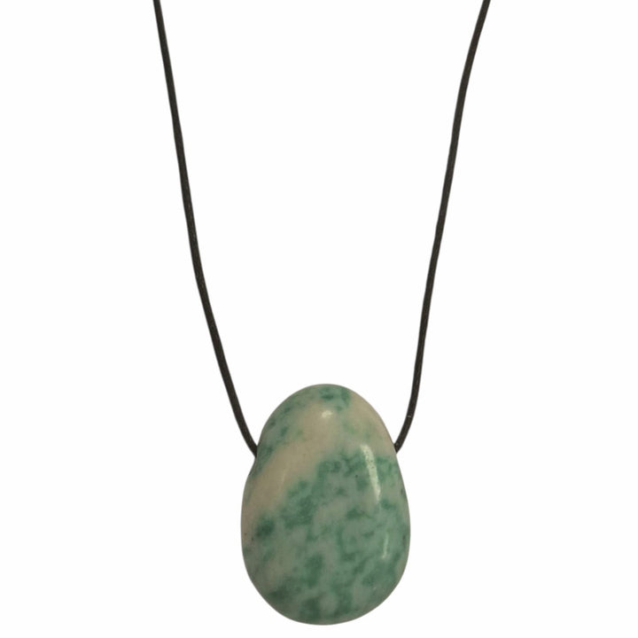 Saussurite drilled tumble stone pendant on a black cord – mottled green crystal for resilience, healing and emotional grounding