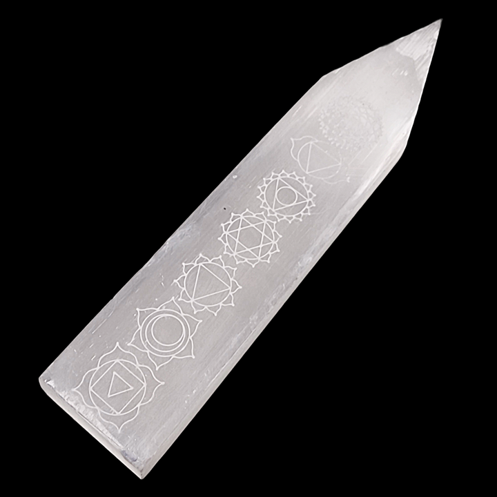 Selenite Chakra Blade – Engraved Polished Wand shown on black background.