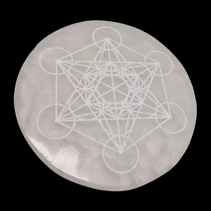 Selenite Charging Disc 10 cm engraved with Metatron’s Cube shown on black background.