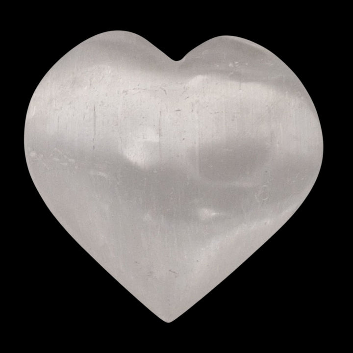 Medium Selenite Heart crystal shown on black background.