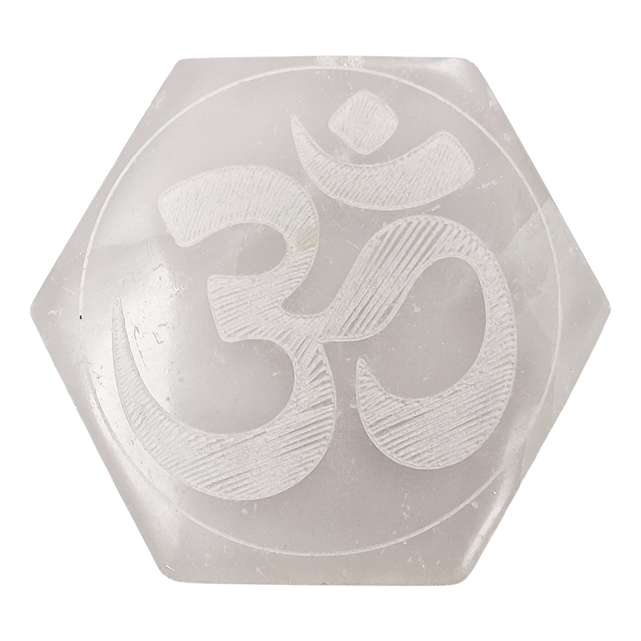 Selenite Hexagon Ohm Engraved Charging Disc shown on white background.