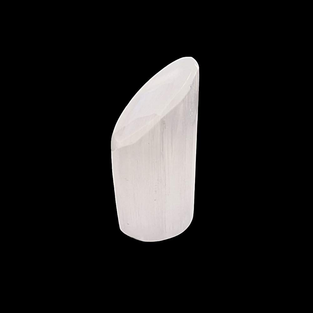 Selenite Lipstick Tower 6 cm natural finish shown on black background.