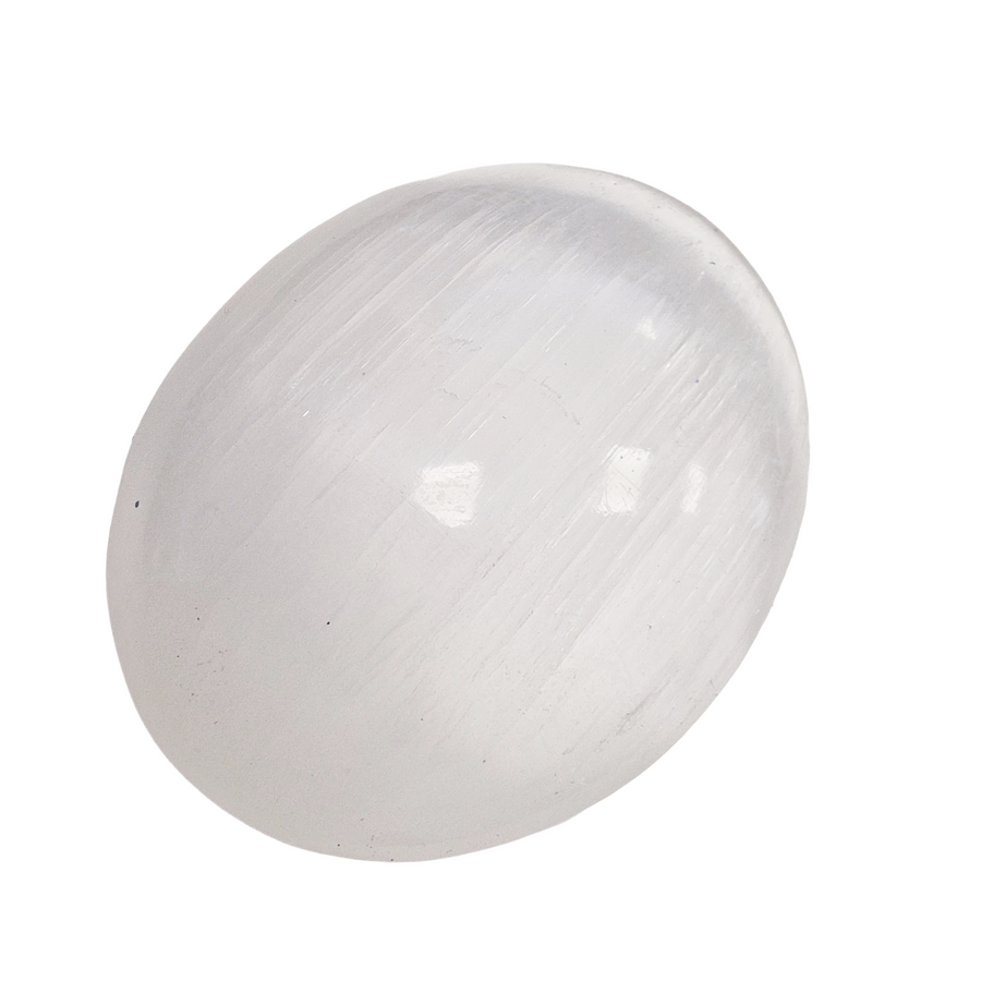 Selenite Palm Stone 90 mm shown on white background.
