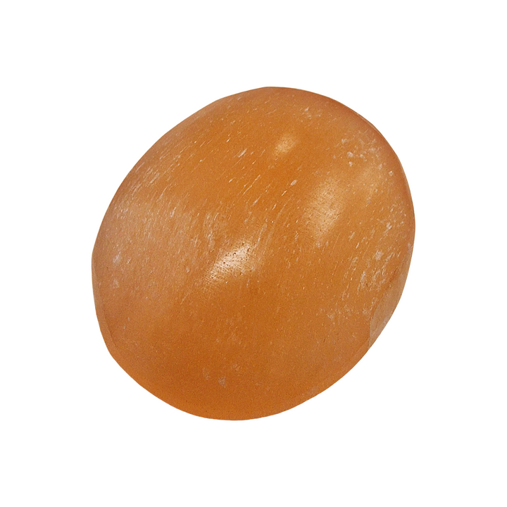 Peach Selenite Palm Stone 70 mm shown on white background.
