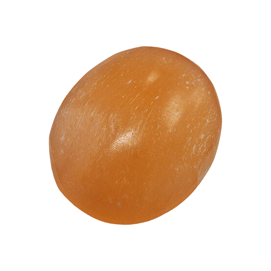 Peach Selenite Palm Stone 70 mm shown on white background.