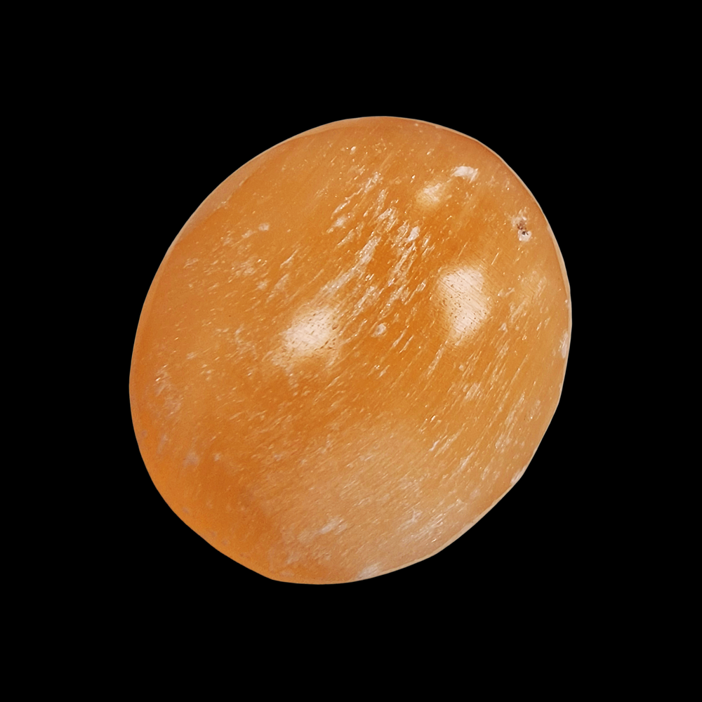 Peach Selenite Palm Stone 70 mm shown on black background.