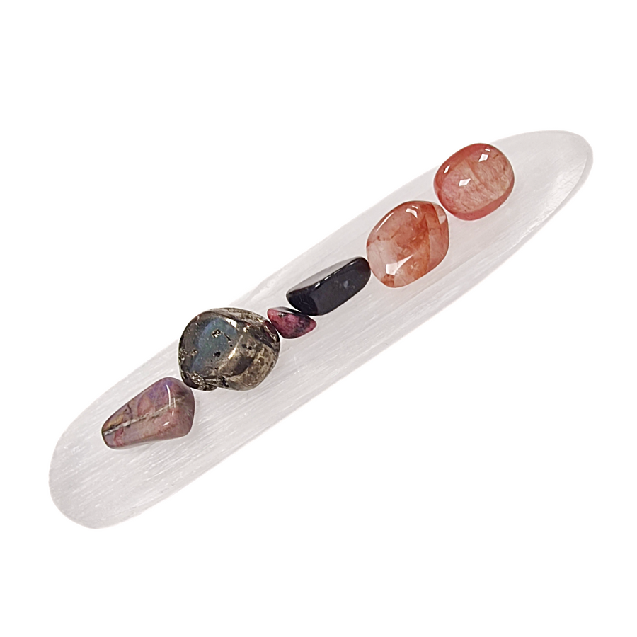 Selenite Charging Tray with Groove shown on white background. with crystals which are not included