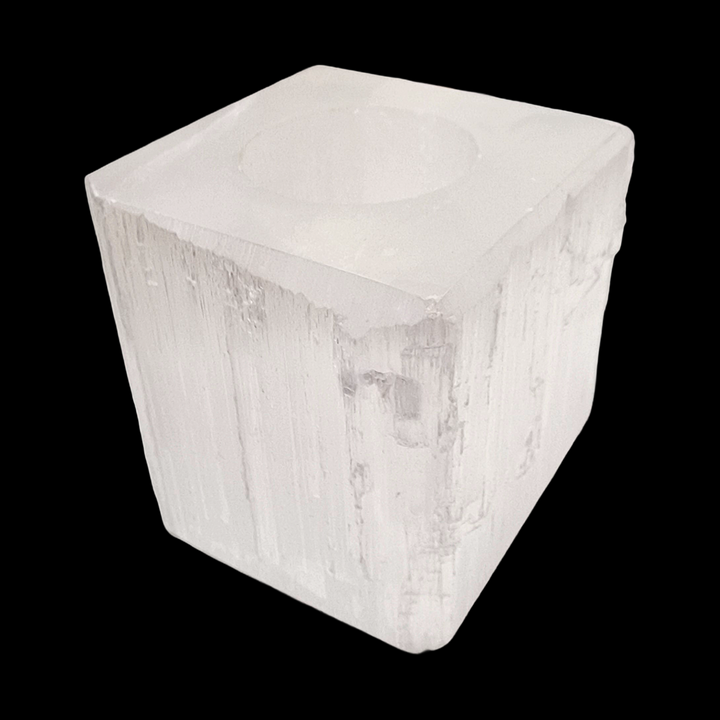 Selenite Square Tea Light Holder with polished top and base, raw sides, shown on black background.