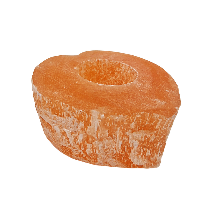 side view of Peach Selenite Heart Tea Light Holder.