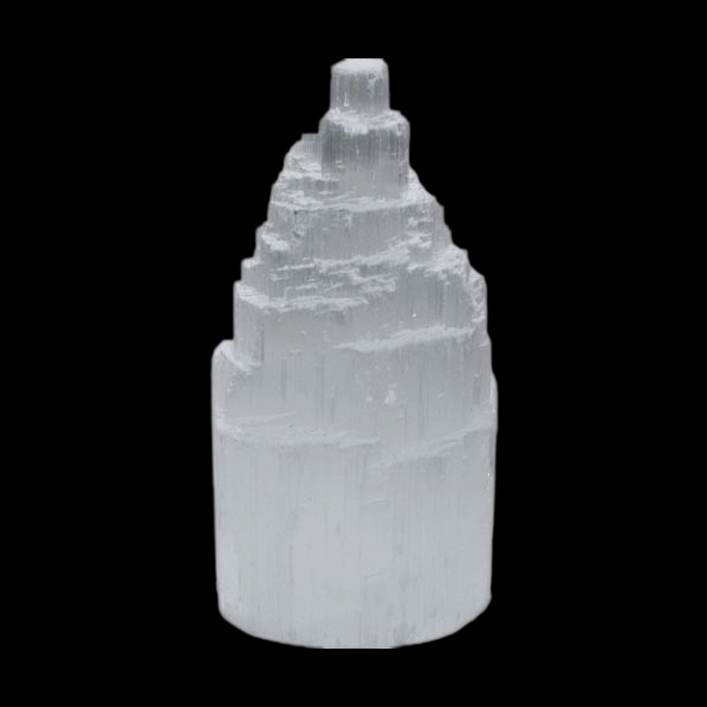 Selenite Tower 10 cm shown on black background.