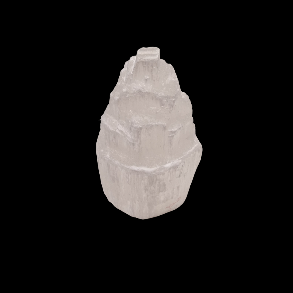 Selenite Tower 5cm raw iceberg mountain effect shown on black background.