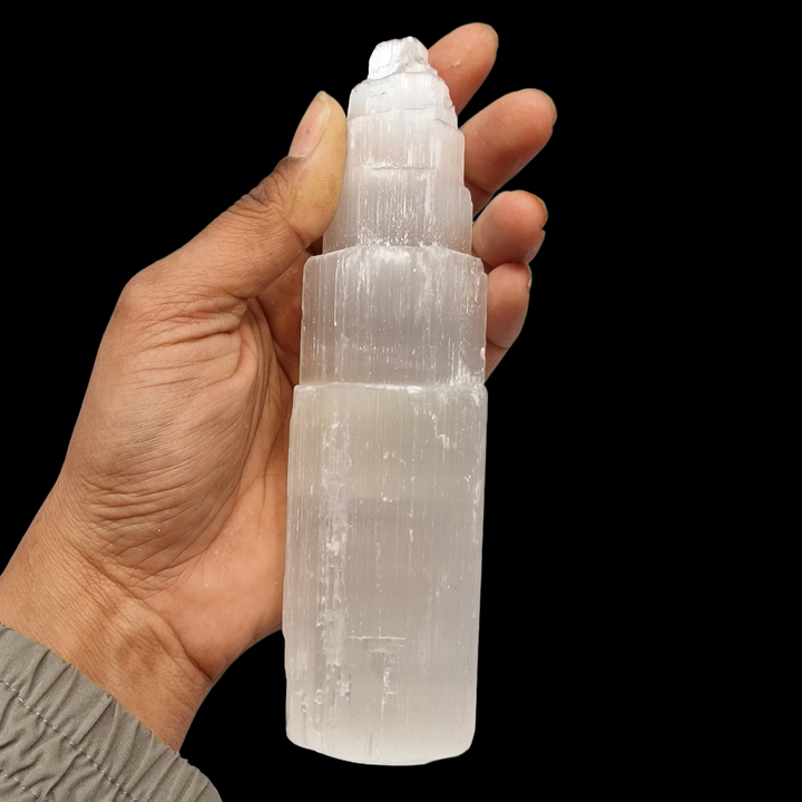 Back of Selenite Tower 15 cm ultra white iceberg finish.