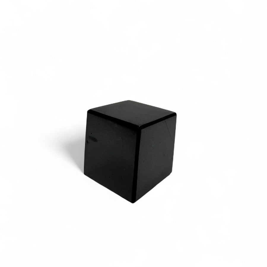 20mm polished Shungite cube mineral specimen on white background – healing crystal for grounding, protection, and EMF shielding.
