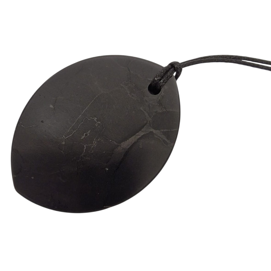 Marquis Shungite pendant on white background, polished crystal necklace for energy harmony
