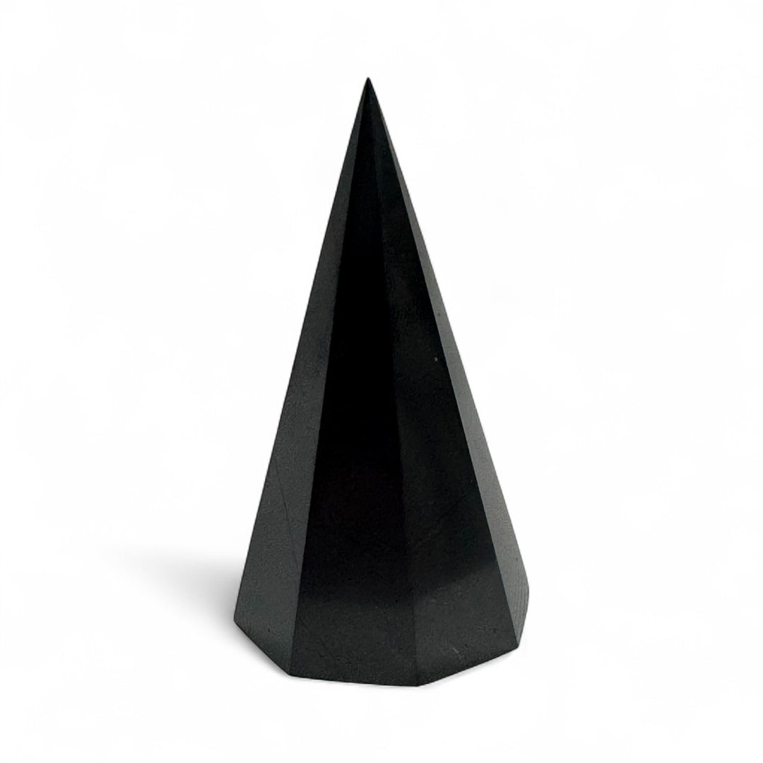 Polished 50mm Shungite octagonal pyramid, black crystal with natural grounding and protective properties, ideal for desk or altar use.