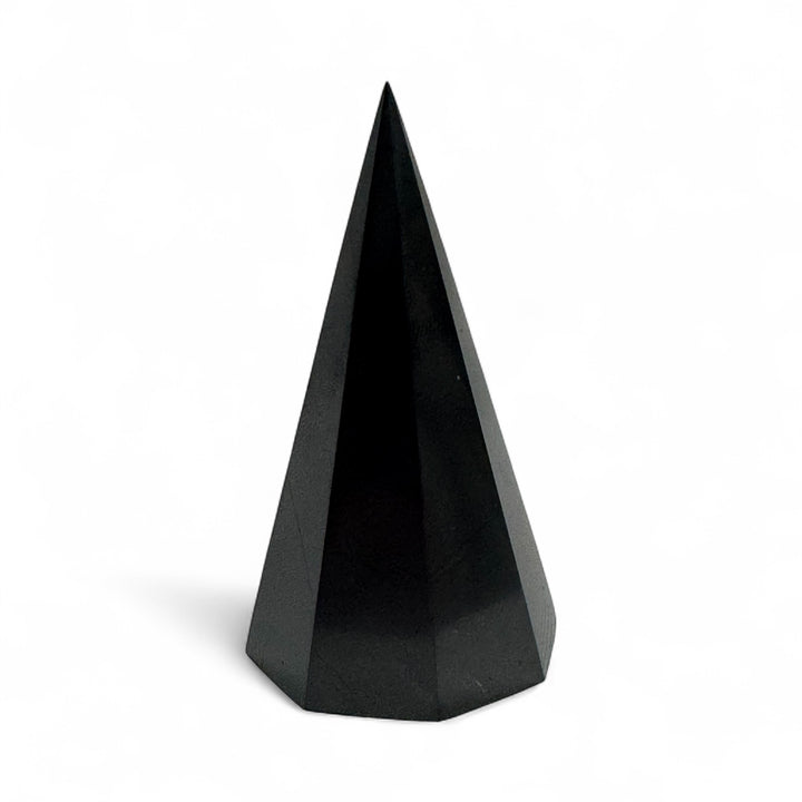 Polished 50mm Shungite octagonal pyramid, black crystal with natural grounding and protective properties, ideal for desk or altar use.