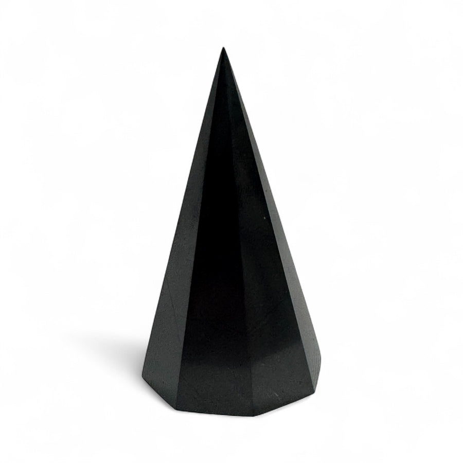 Polished 50mm Shungite octagonal pyramid, black crystal with natural grounding and protective properties, ideal for desk or altar use.