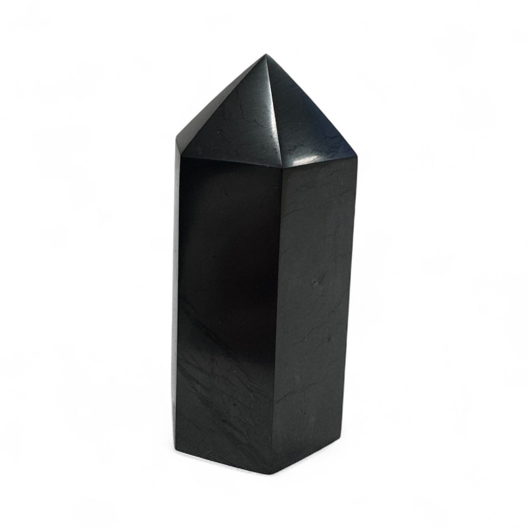 Single 5cm polished shungite tower point, used for grounding, EMF protection, and energy balance.