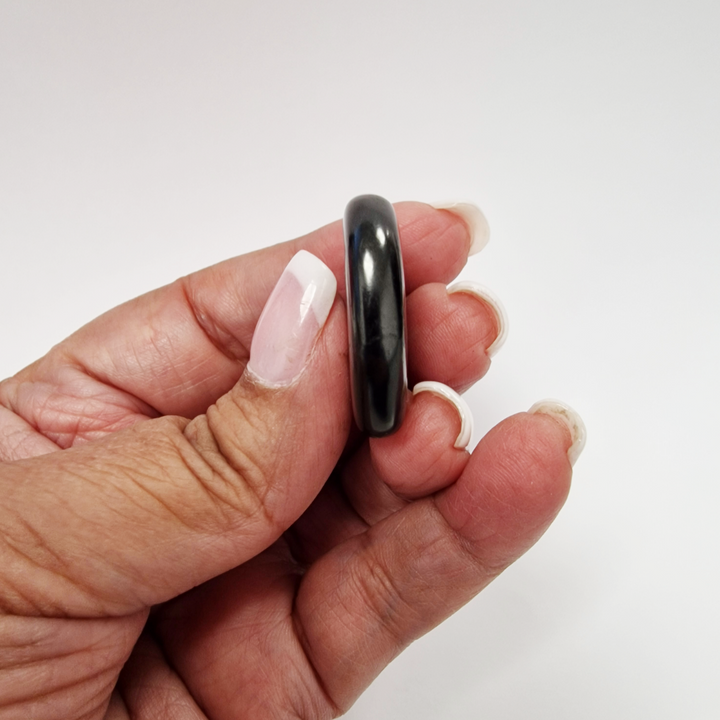 Shungite 30mm heart on hand, grounding crystal for EMF protection and emotional balance
