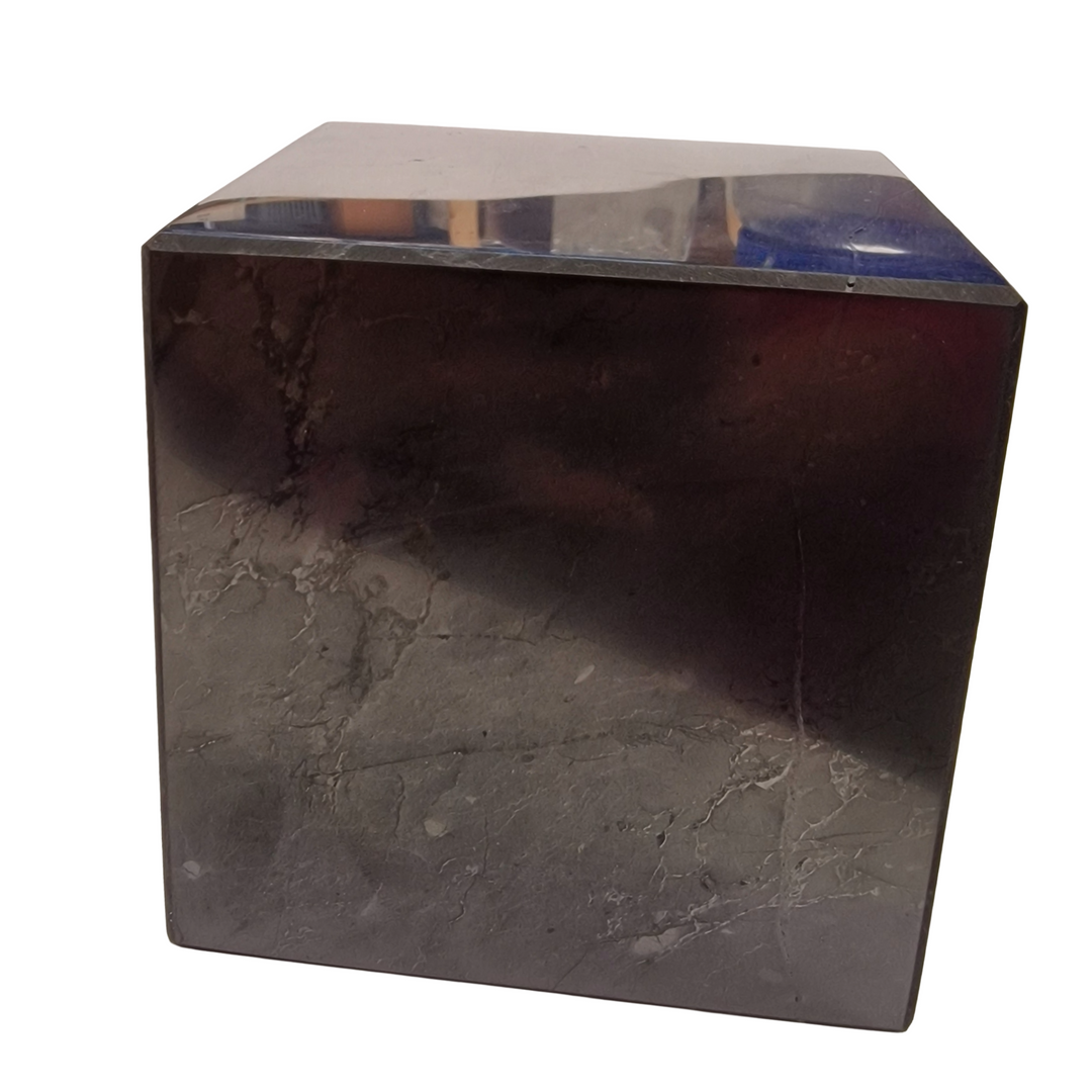 Side view of Shungite 10cm Cube on white background, grounding crystal for purification and protection