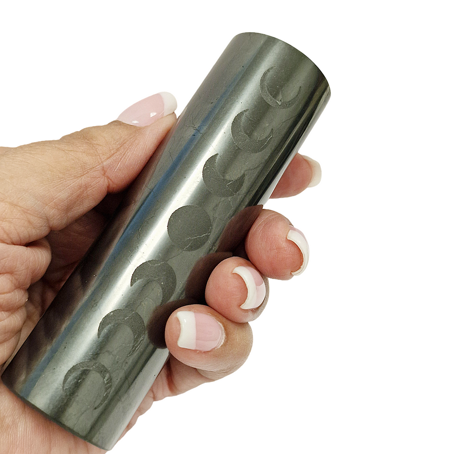 Side view of Shungite Cylinder 10cm on white background, EMF protection and grounding crystal with moon phase design