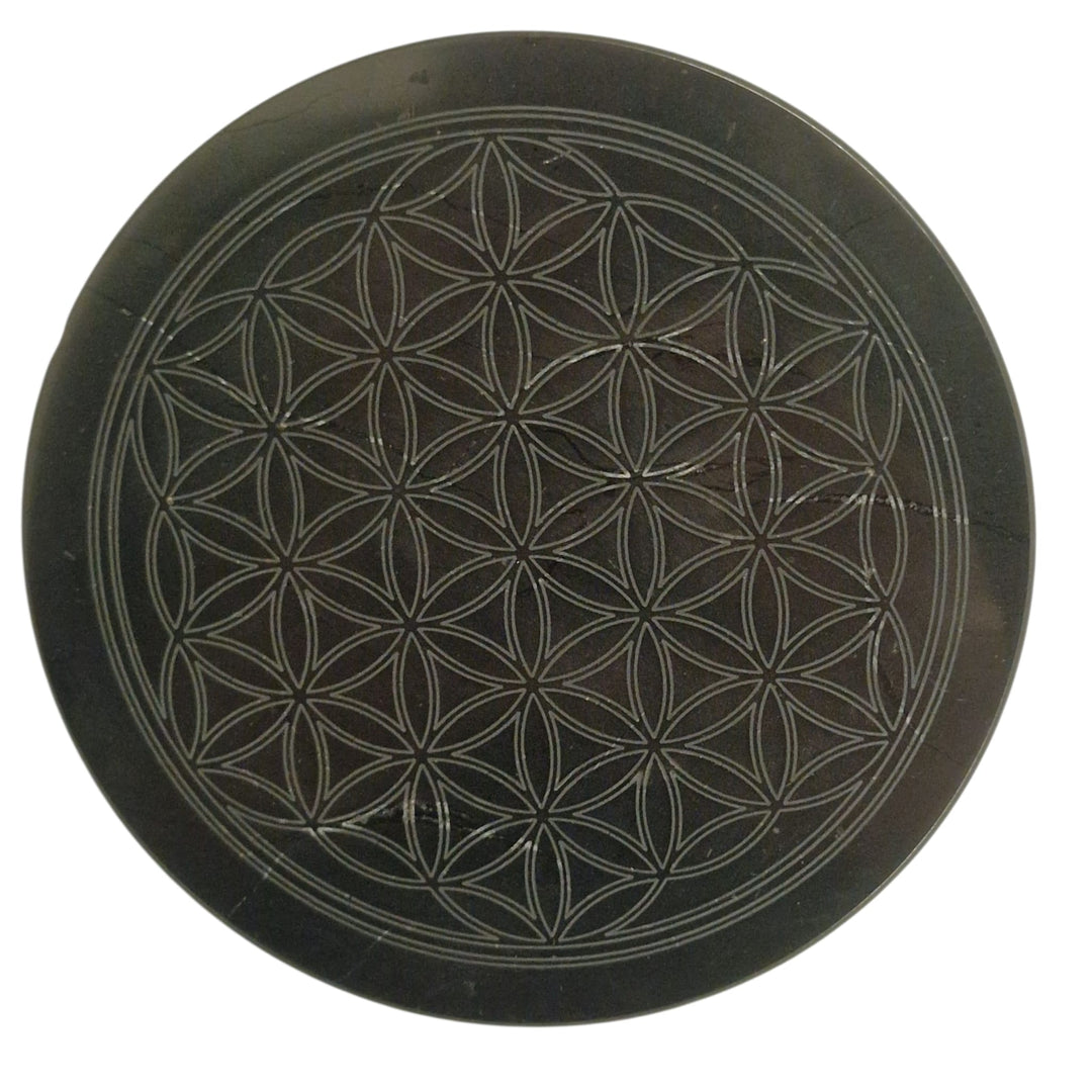 Shungite 10cm square disc with Tree of Life engraving on white background, charging plate for crystals and jewellery