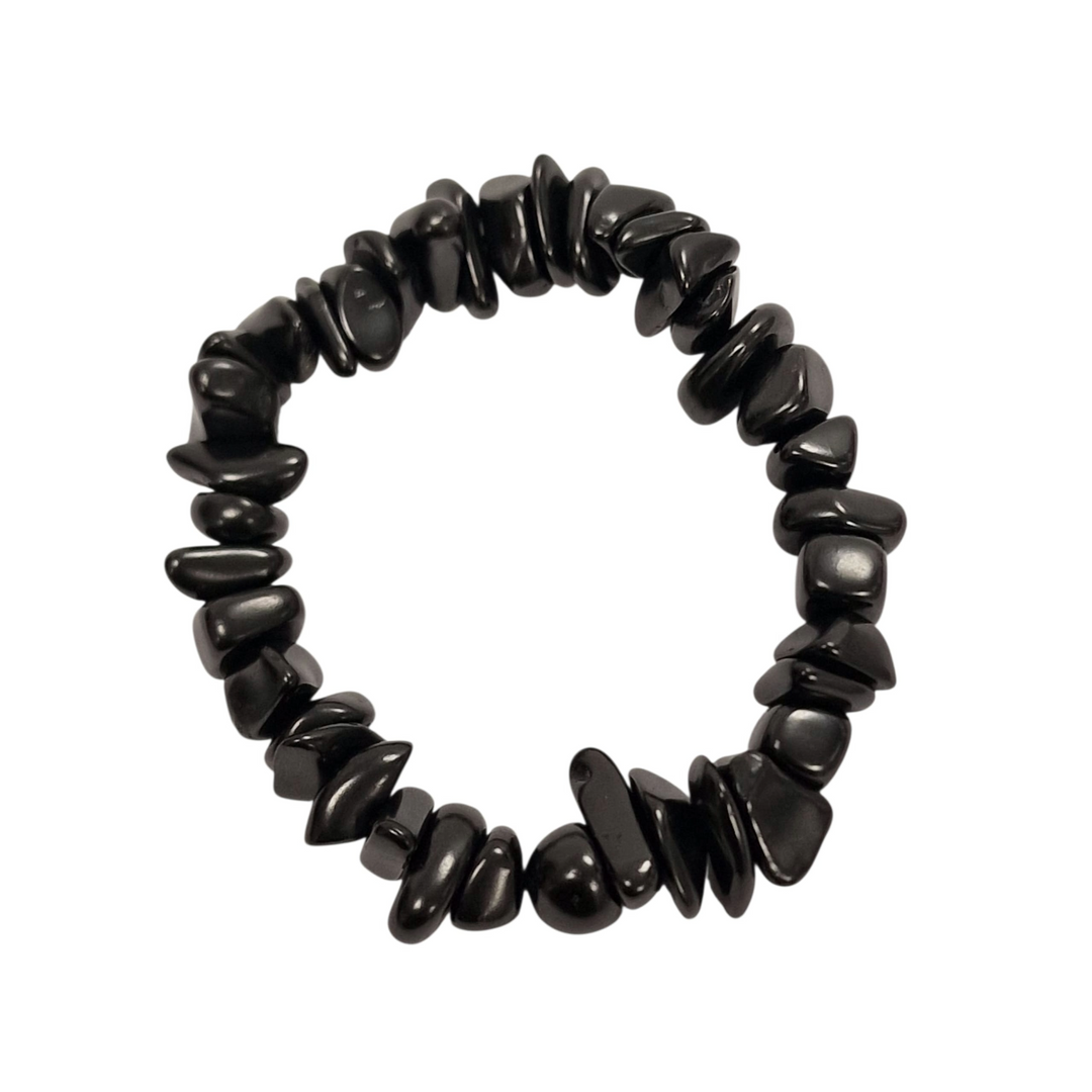Shungite gem chip bracelet on white background, natural stone energy protection jewellery