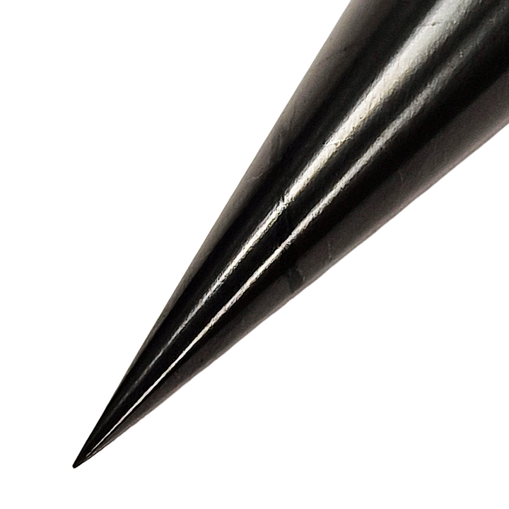 Close-up of sharp precision tip of professional weighted Shungite pendulum, designed for accurate indoor and outdoor dowsing