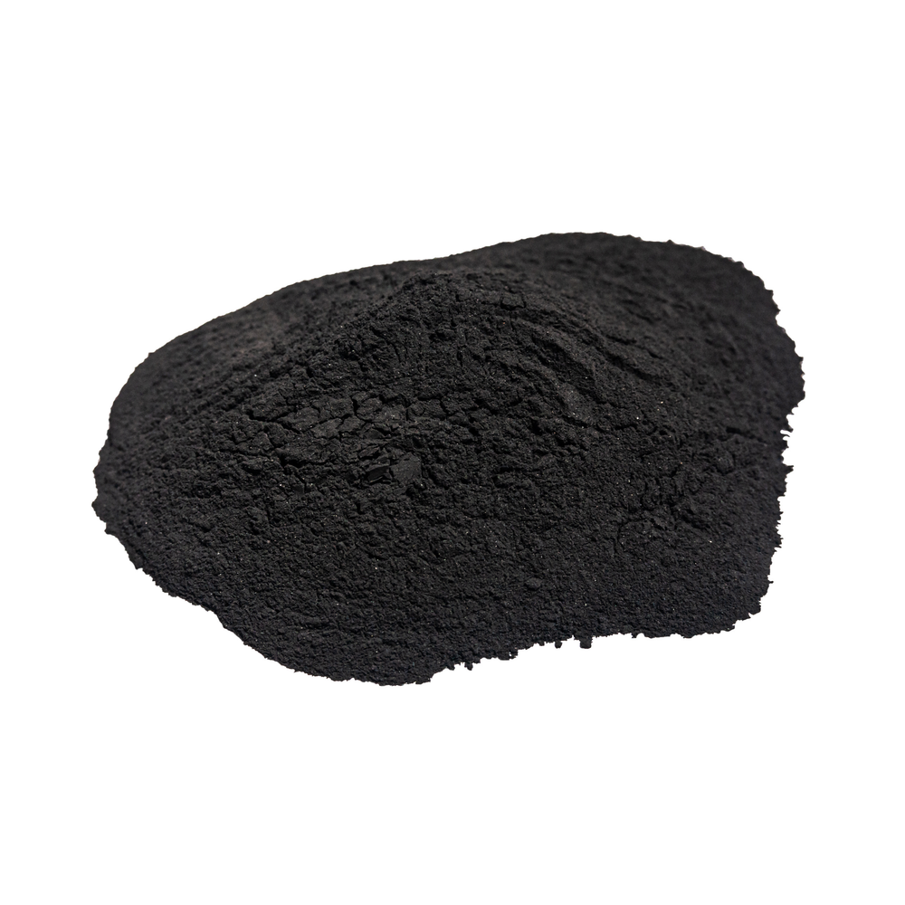 Close-up of fine Shungite powder texture, deep black mineral cosmetic material