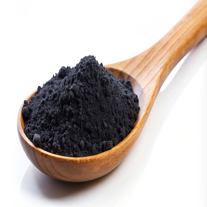 Shungite powder bowl with spoon, ready for natural skincare use