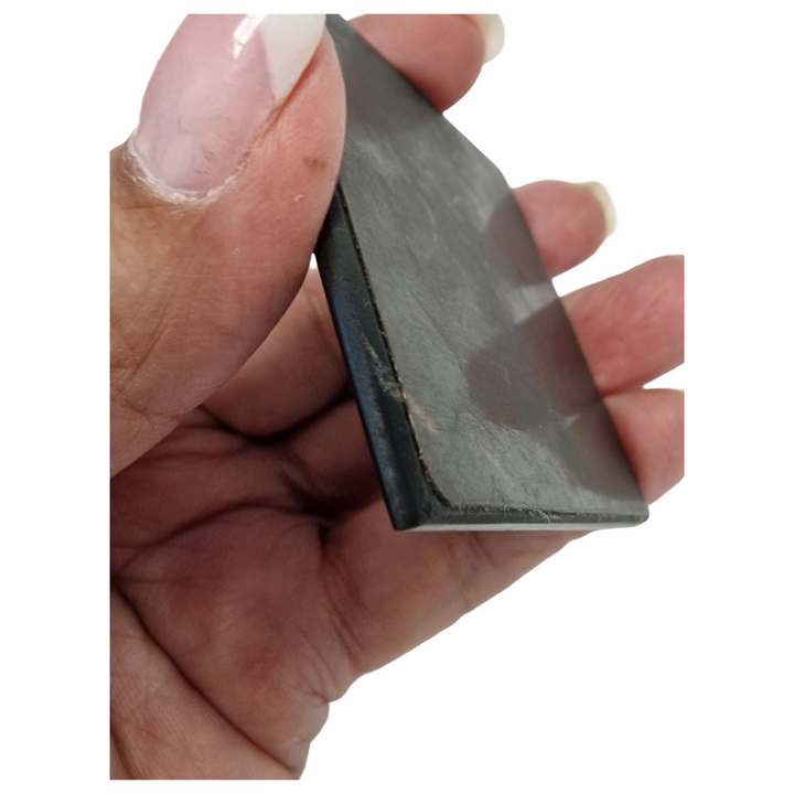 Shungite protective square slice for laptop on hand, natural EMF shielding crystal