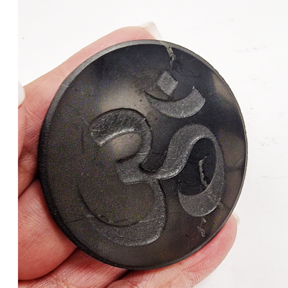 Shungite round 50mm Ohm engraved protective slice on hand, grounding and EMF protection crystal