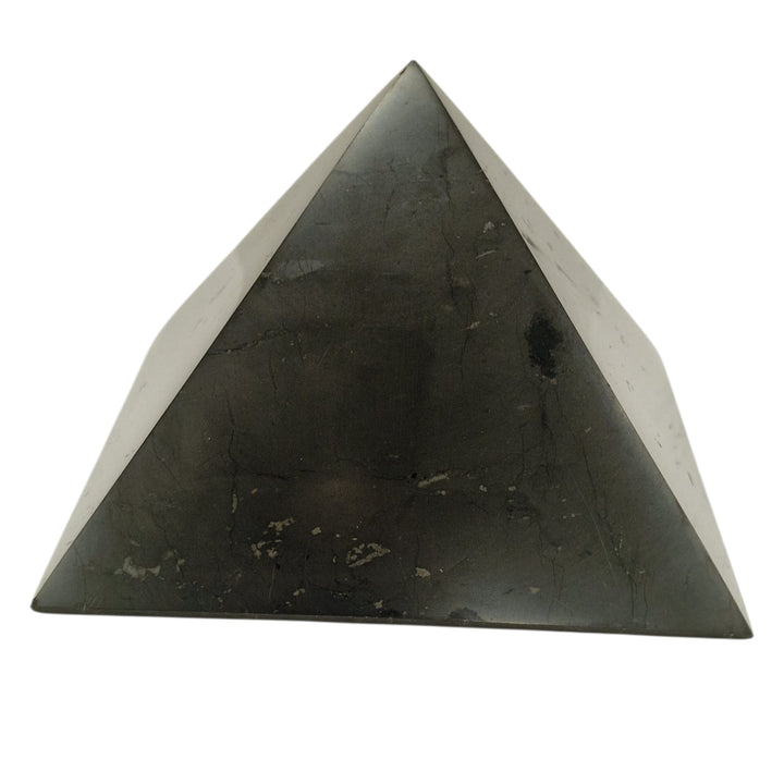 Shungite 10cm square disc with Yin Yang engraving on white background, crystal charging plate for harmony and balance