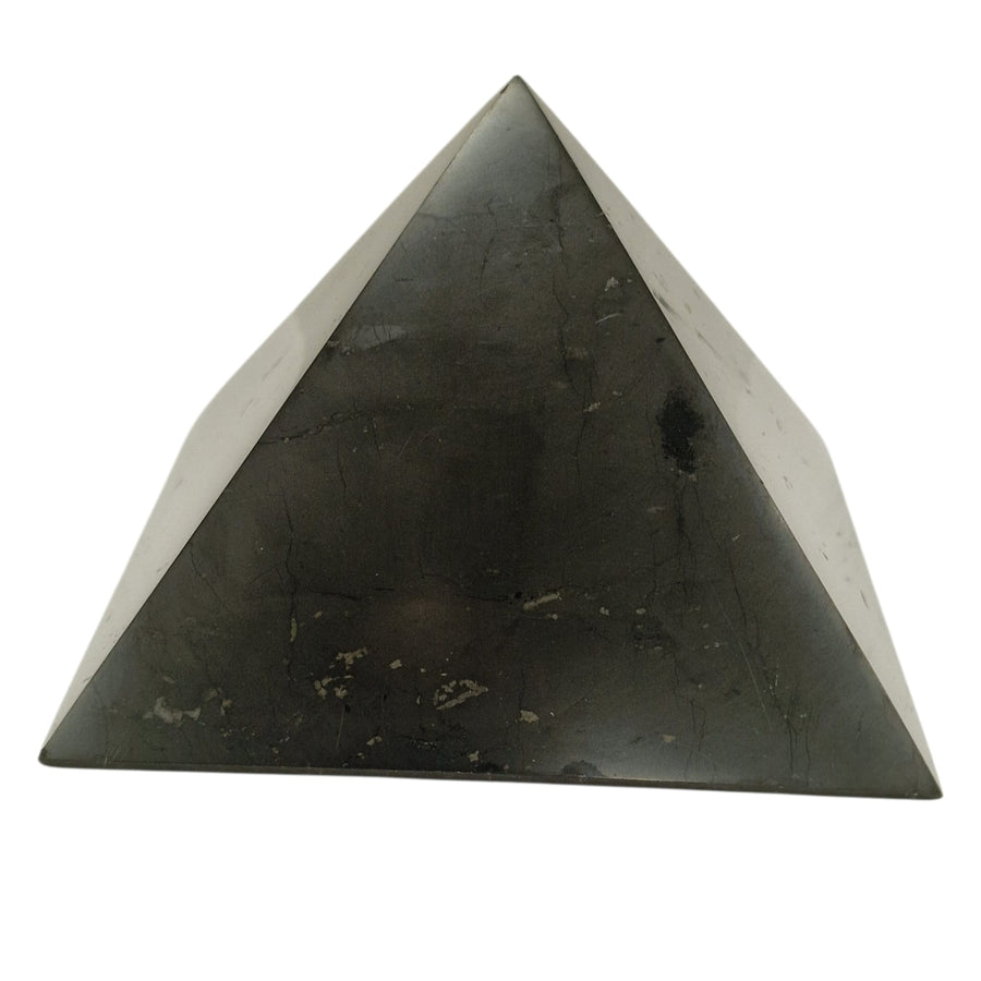 Shungite 10cm square disc with Yin Yang engraving on white background, crystal charging plate for harmony and balance