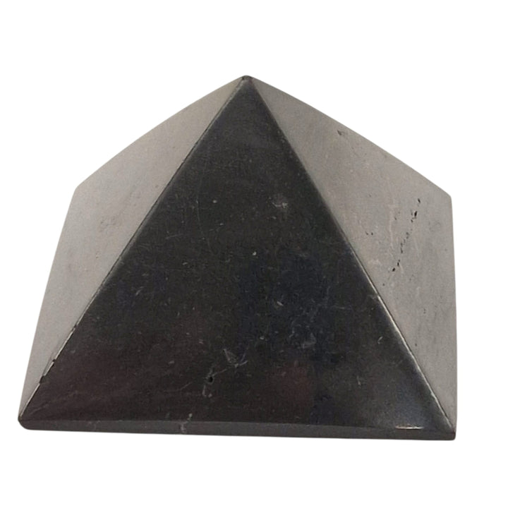 Shungite 40mm Pyramid on white background, polished pyramid for protection and energy balance