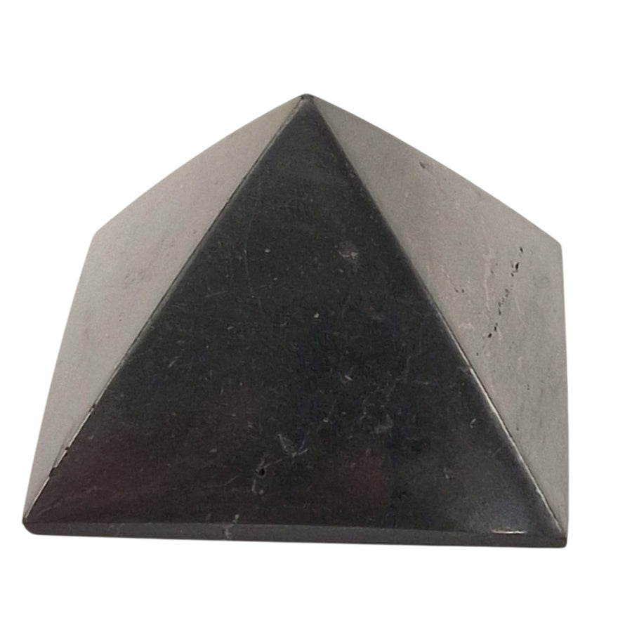 Shungite 40mm Pyramid on white background, polished pyramid for protection and energy balance