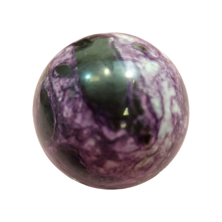 GeoFossils Iowaite Sphere from Russia, a rare green crystal sphere for clarity, communication, and emotional detox.