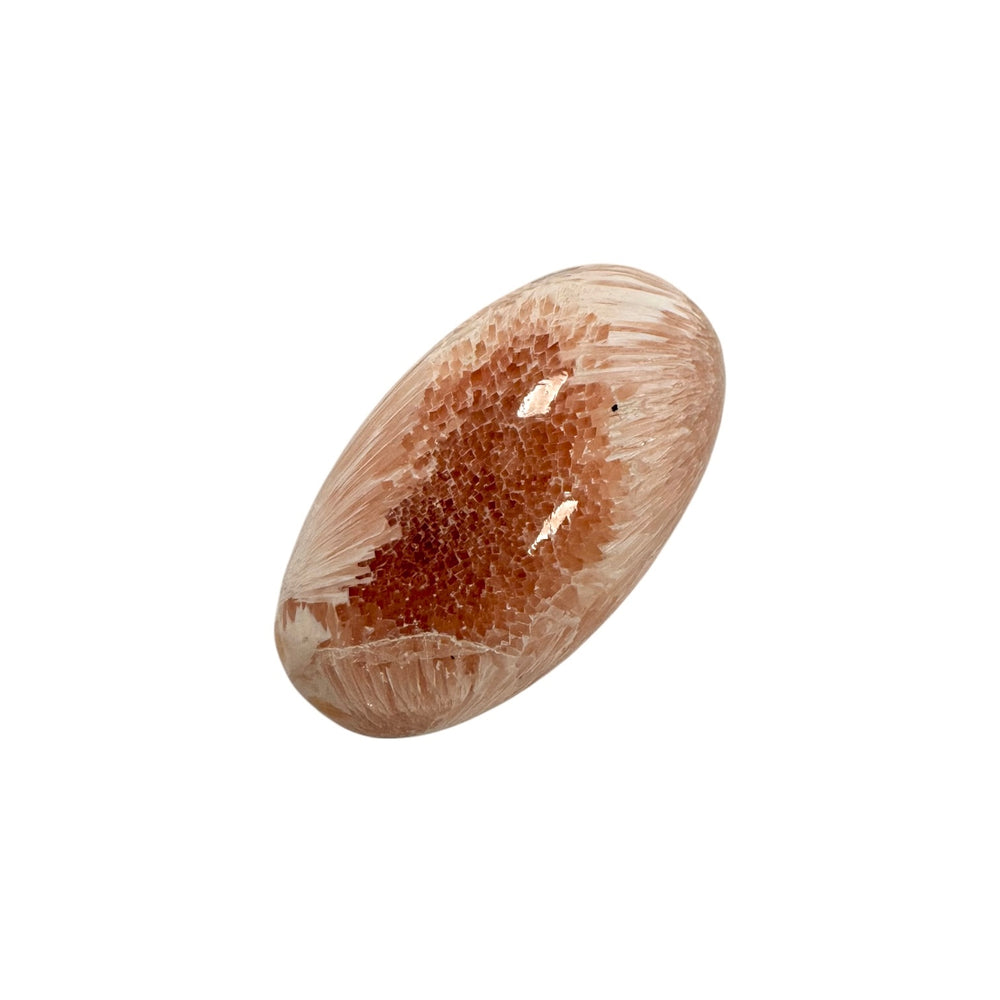 GeoFossils Stilbite in Scolecite Shiva Lingham – exact crystal shown, polished pink and white zeolite crystal for peace, compassion, and spiritual growth.