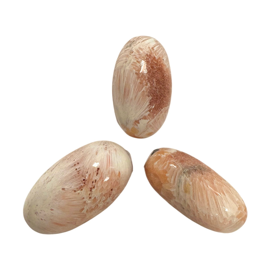 GeoFossils Stilbite in Scolecite Shiva Lingham – exact crystal shown, polished pink and white zeolite crystal for peace, compassion, and spiritual growth.