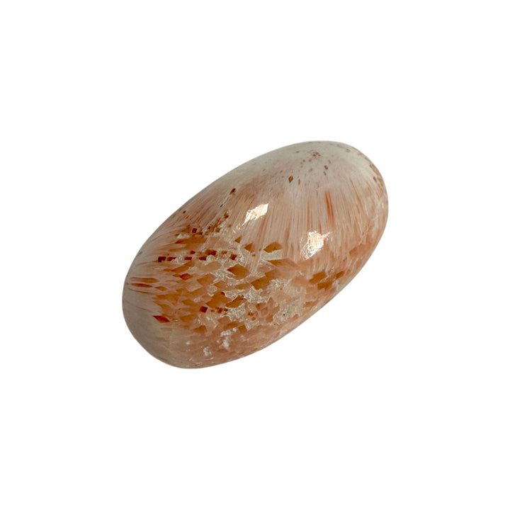 GeoFossils Stilbite in Scolecite Shiva Lingham – exact crystal shown, polished pink and white zeolite crystal for peace, compassion, and spiritual growth.