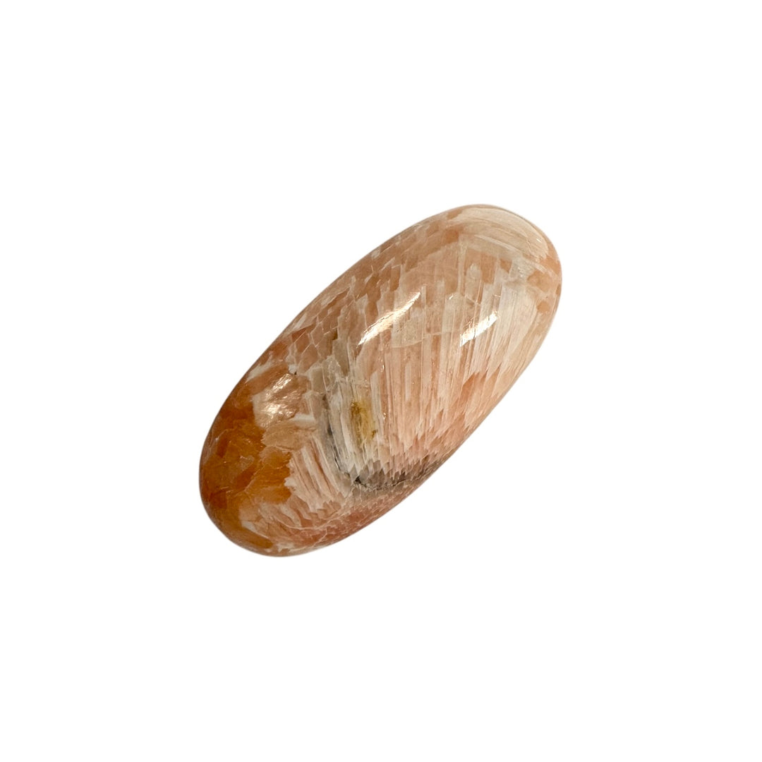 GeoFossils Stilbite in Scolecite Shiva Lingham – exact crystal shown, polished pink and white zeolite crystal for peace, compassion, and spiritual growth.