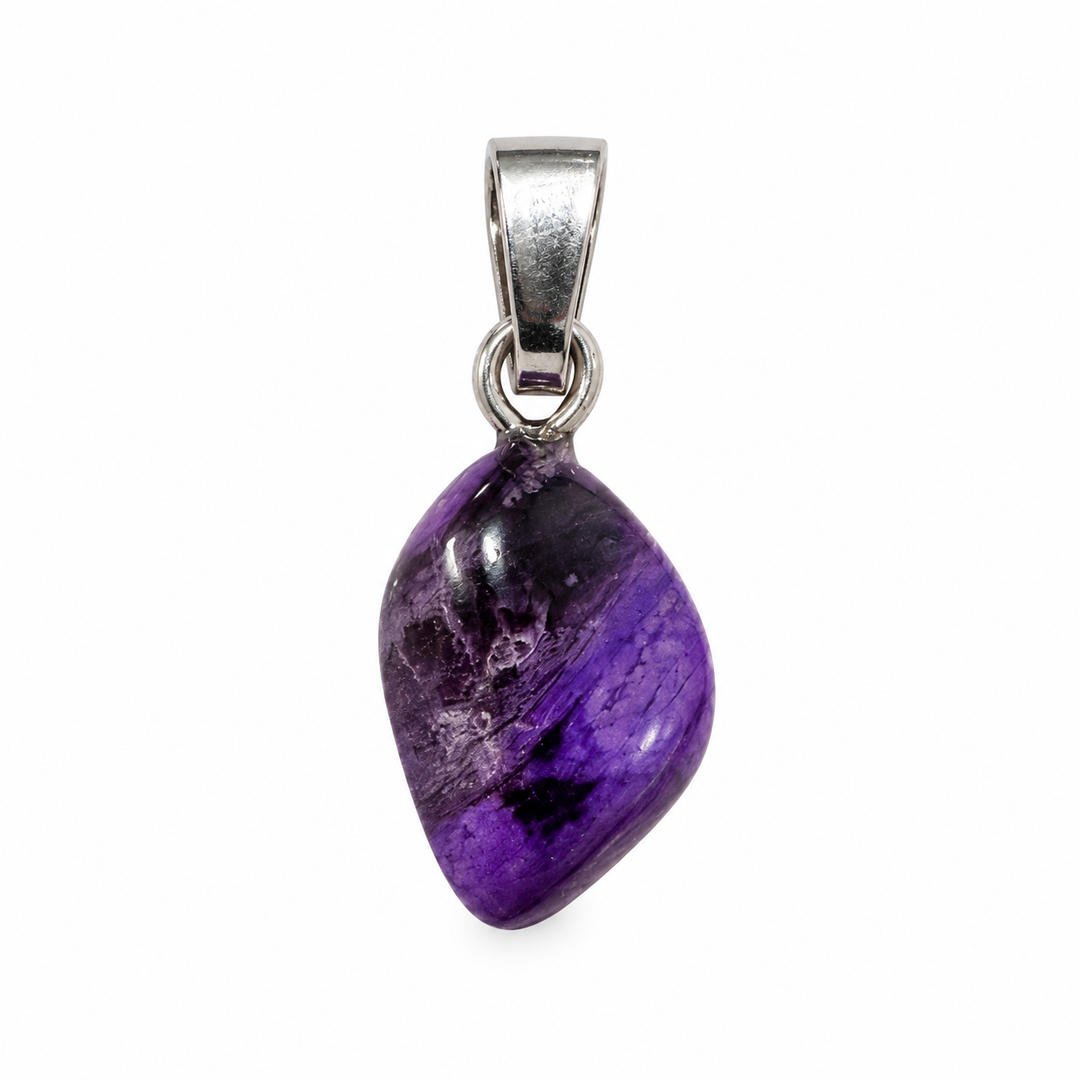 GeoFossils natural Sugilite pendant featuring rich purple colouring, distinctive dark veining and a polished freeform gemstone with a sterling silver bail, photographed against a white background.