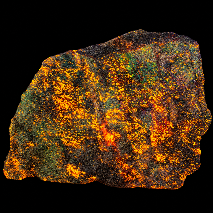 GeoFossils Svabite Specimen 162 displaying orange fluorescence under Short Wave (SW) UV