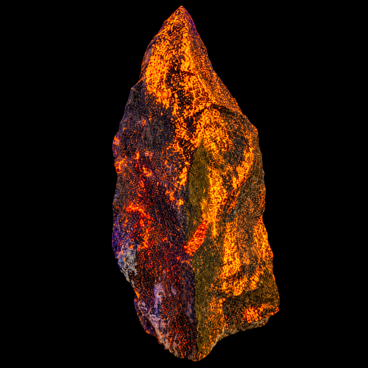 GeoFossils Svabite Specimen 165 displaying orange fluorescence under Short Wave (SW) UV