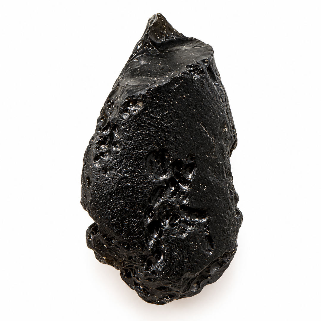 GeoFossils 15g Tibetan tektite specimen with a naturally irregular black surface, glossy areas and distinctive pits.