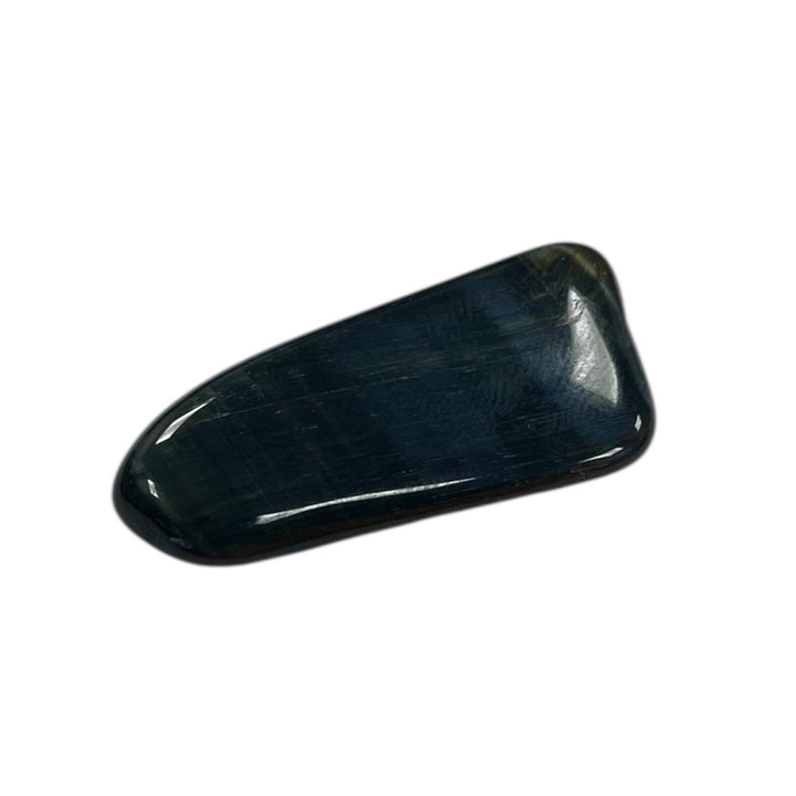 GeoFossils Polished Blue Tiger’s Eye tumble stone crystal with deep chatoyant blue and gold bands, used for calming anxiety, enhancing clarity, and grounding energy in holistic healing and meditation